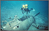 SolSunkenAircraftInHarbor